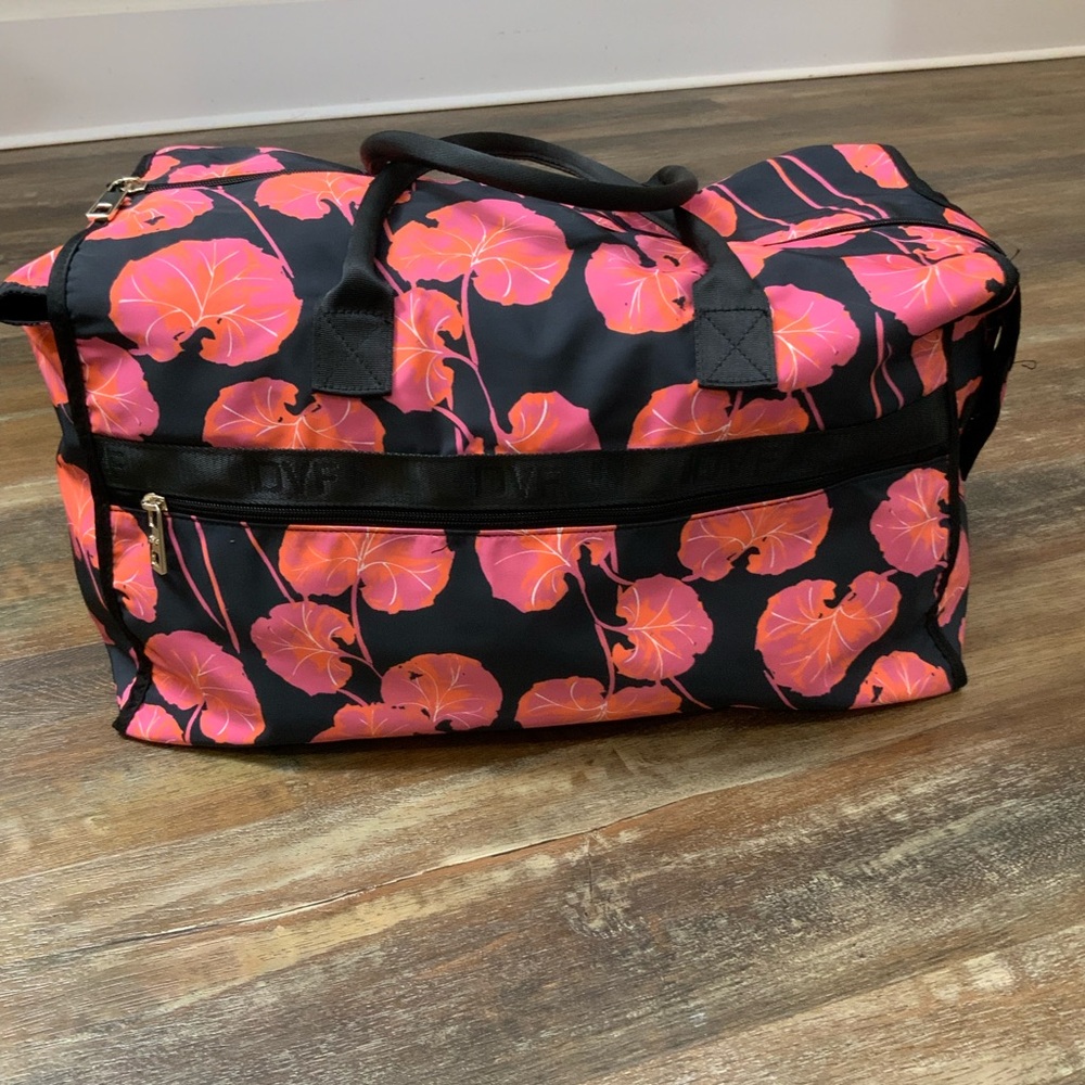 Escape for the weekend with Diane von Furstenberg Kimono Leaf Weekender Duffel.